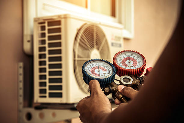 Professional Heat Pump Repair technician working in Lithopolis, OH